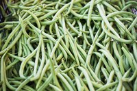 Green beans for sale at a market.