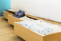 Platform beds with drawers add welcome storage space in closetless bedrooms.