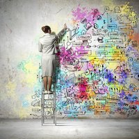 A woman maps out a product development plan.