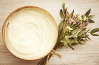 Avoid the chemicals by making homemade goat's milk body lotion.