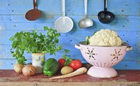 Pretty vegetable strainer on countertop.