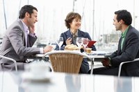 Business partners are having a lunch discussion.