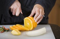 Cutting and drying oranges can add color to your decorations.