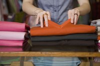 Sort clothing by fabric or seasons before packing them into boxes.