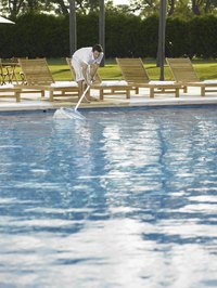 A pool skimmer makes oil clean-up easier.