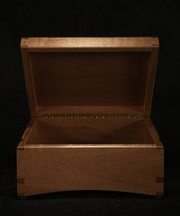 Line boxes with thick felt for cushioning.