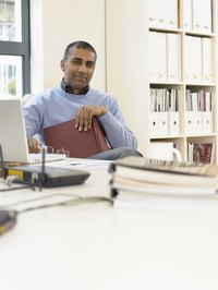 Nonprofit employee using a laptop to work on accounting.