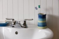 Personal hygiene products on the sink.