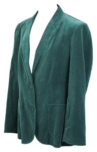 Read garment care tags carefully before treating a stained blazer.