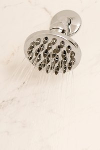 Water leaking behind the shower head can cause big problems.