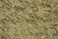 The texture of stucco makes silicone difficult to remove when warm.