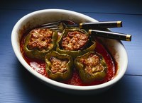Serve a medium-bodied red wine with stuffed peppers in tomato sauce.