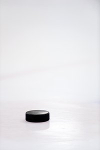 Use a hockey puck as inspiration for your Halloween costume.