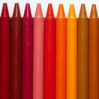 Make a suncatcher by melting crayons between sheets of wax paper.