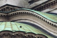 Copper roofs naturally turn green from exposure to the elements.