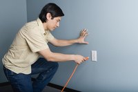 Electrical cords are quite noticable against a wall.