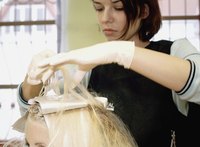 Ask a friend to help you darken your roots for the first time.