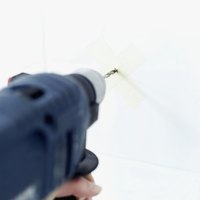Tape the tile prior to drilling to avoid chipping it.