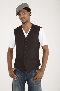Pairing your newsboy cap with a vest gives you an outfit with plenty of vintage flair.