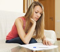 Woman reading over letter of employment