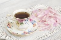 Tea cup with flower petals.