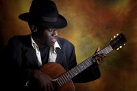 Hire local blues musicians to play.