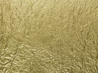 Use heat to transfer a gold foil image to an object.