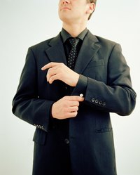 If your suit has been to the tailor, it may come home with unwanted marks.