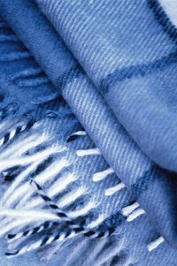 Winter scarves often have fringed ends that match the colors of the scarf.