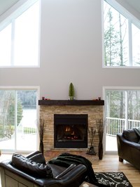 A floating mantel typically resembles a single shelf mounted on the wall above the fireplace.