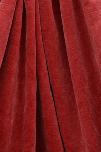 Make a cape fit for a king out of velvet and fur trim.