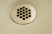 Use a hair catcher on your drain.