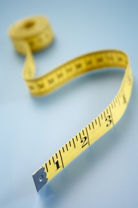 Measure your wrist with a tape measure.