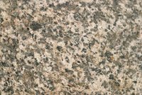 Place granite tiles together to make a seamless-looking surface.
