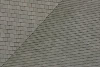 A valley's shingles divert the water from two roof planes.