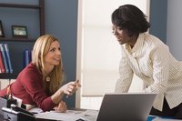 Two business women developing a business strategy.