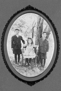 Transfer a vintage photo with cellulose thinners for a unique scrapbook page.