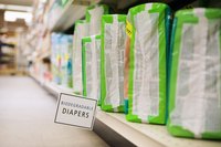 Turn a bag of diapers into a tractor filled with baby gifts.