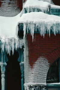 Icicles hanging from your eaves may look pretty but signify a real problem.
