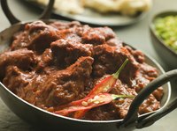 Choose healthier oils over ghee for curry-making to cut saturated fat.