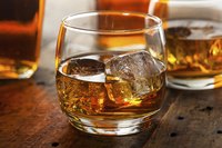 A glass of whiskey.