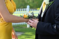 Match your tie and the corsage to the girl's gown for a classic approach.