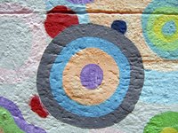 A homemade compass allows you to create circles of any size on a wall.