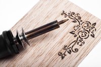 The tools that work for burning wood also work on leather.