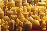 An assortment of homemade beeswax candles.