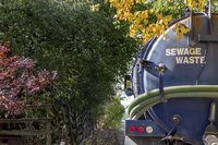 A septic tank pump truck.