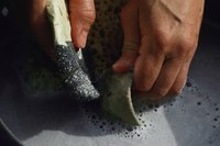 Trisodium phosphate and water can be used to clean and disinfect garden pots.