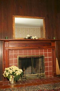 A wooden mantel that ties into the home's overall style is best.