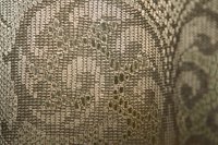 Lace has openings allowing the material to work like a stencil.