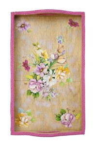 Cut out paper images to create a decoupage design on a wooden tray.